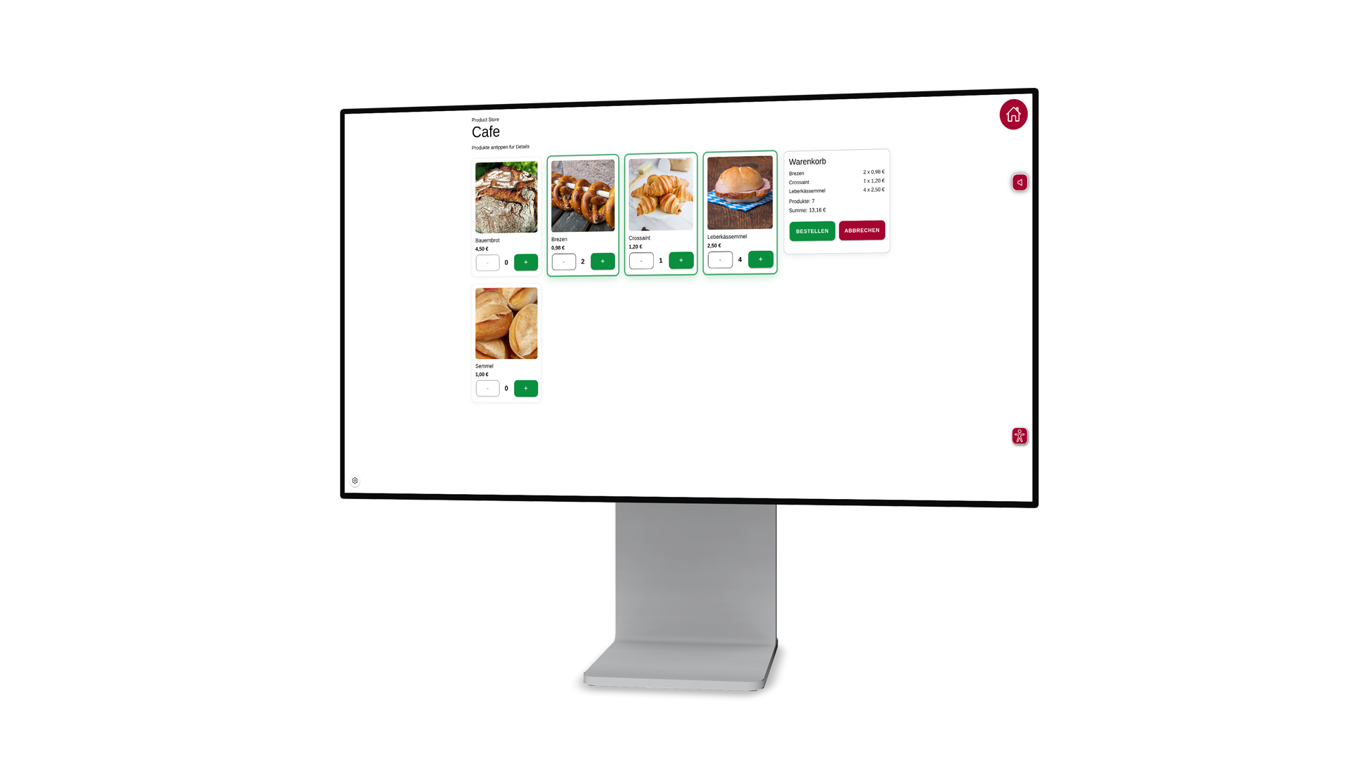 Monitor showing an online cafe product page with a grid of bread items (Bauernbrot, Brezen, Croissant, Semmel) and a right-hand checkout panel summary with a green 'Bestellen' button and red 'Abbrechen' button, all arranged in a white UI on a black frame monitor.